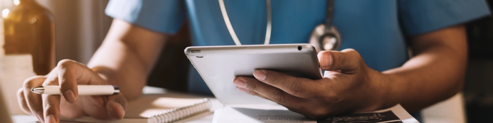 doctor using a tablet